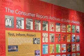 Exhibit panel showing historical covers of Consumer Reports magazine